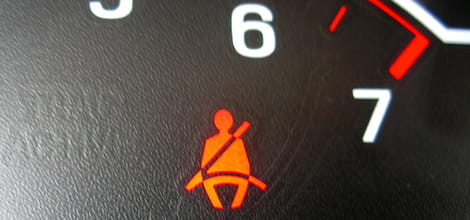 Seatbelt sign on dashboard
